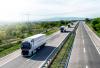 Trucks driving on road