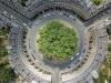 Circle roundabout with cars and trees