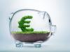Glass piggy bank with green euro